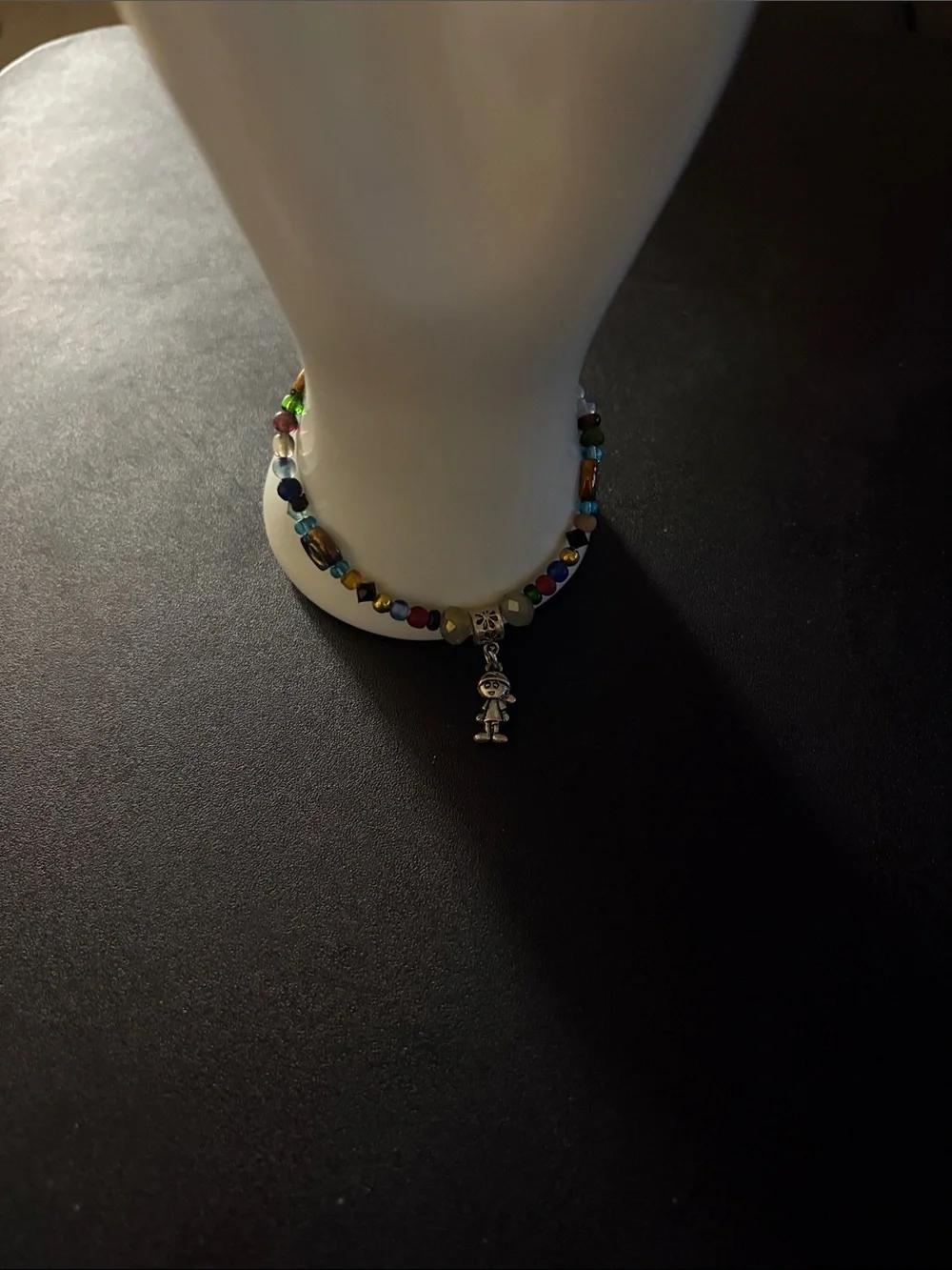 Multicolor Beaded Charm Bracelet with Silver Doll Pendant